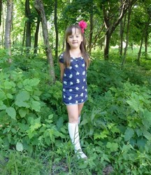 small girl in shorts